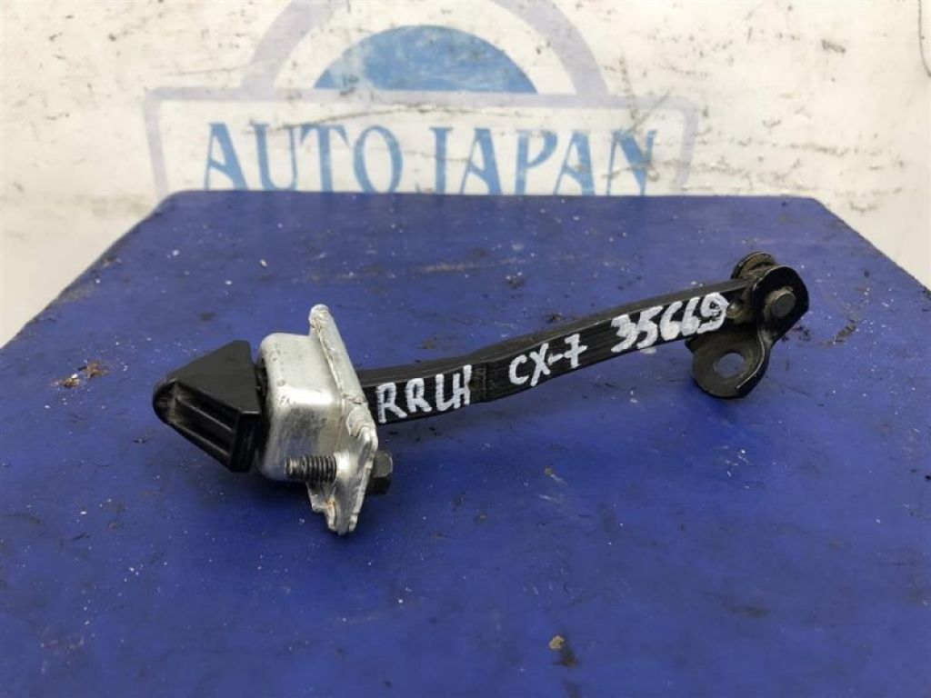 EG21-72-270C | Обмежувач дверей задн. лів. MAZDA CX-7 06-12 - Фото 2