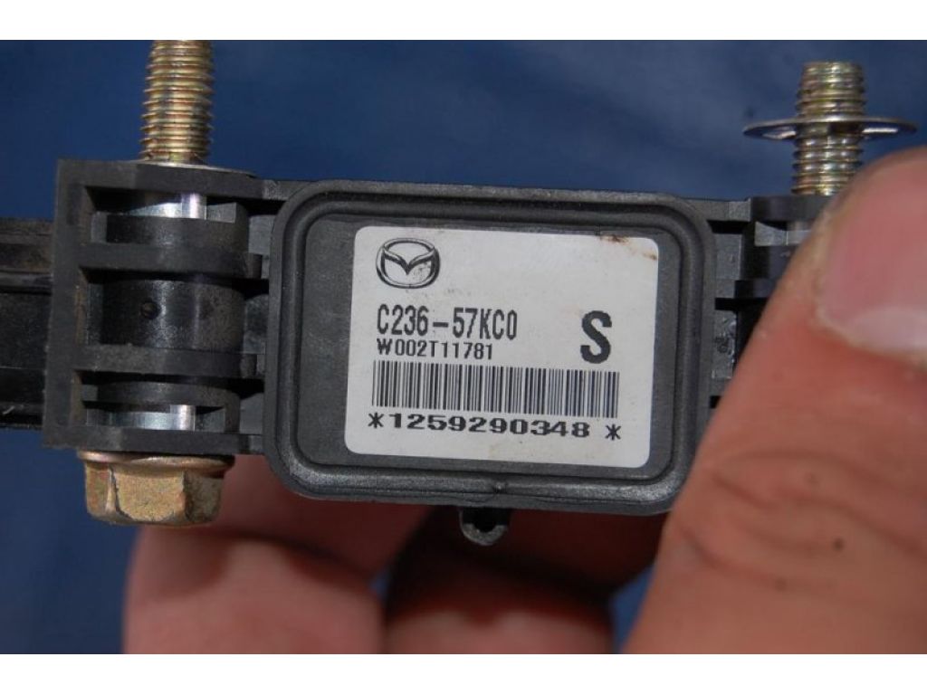 C236-57-KC0 | Датчик удара MAZDA 5 CR 05-10 - Фото 3