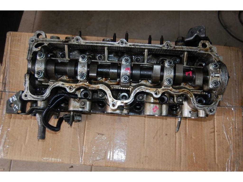 Y701-10-090 | Головка блоку циліндрів MAZDA 323 BA 94-97