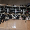 Y701-10-090 | Головка блоку циліндрів MAZDA 323 BA 94-97