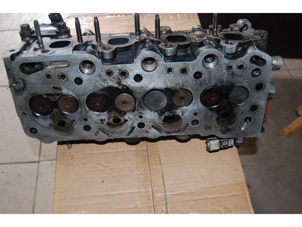 Y701-10-090 | Головка блоку циліндрів MAZDA 323 BA 94-97 - Фото 2
