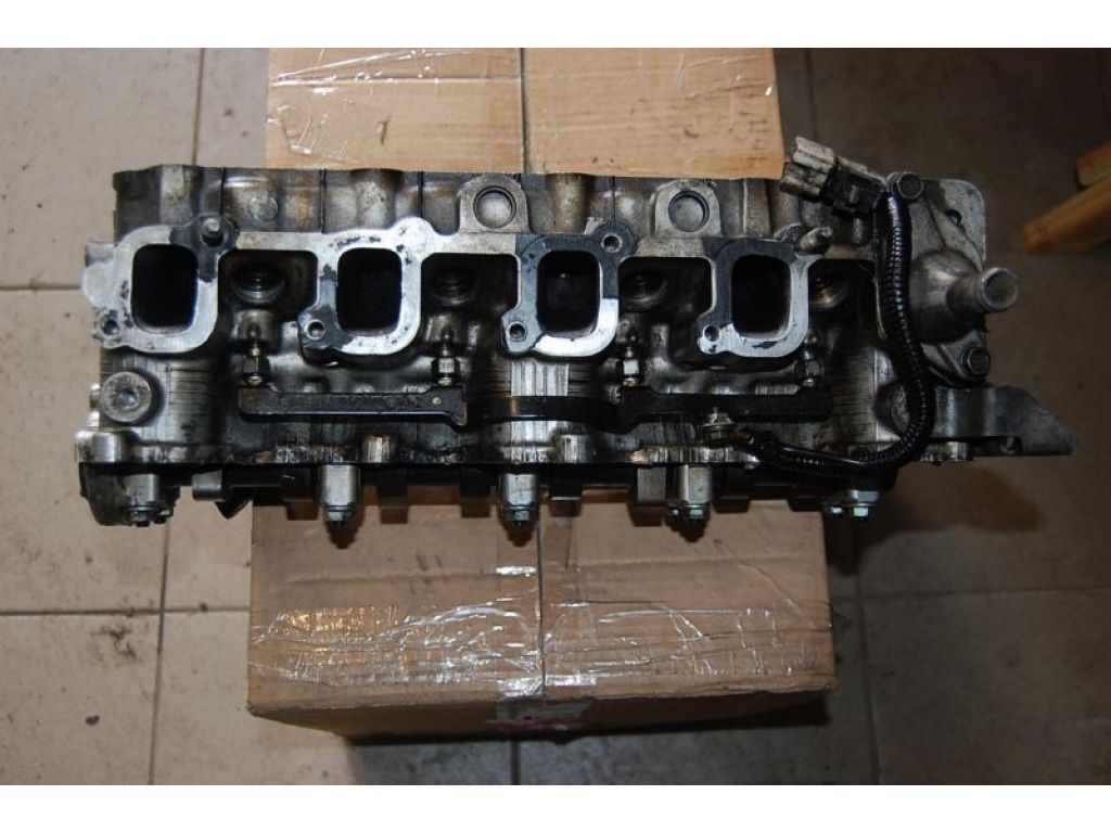 Y701-10-090 | Головка блоку циліндрів MAZDA 323 BA 94-97 - Фото 4