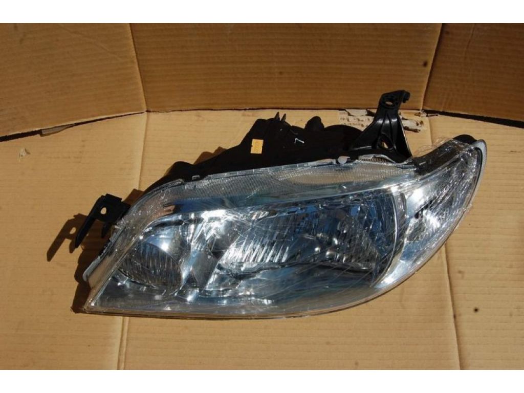216-1144R-LD-EM | Фара передн. лев. MAZDA 323 BJ 98-2003 - Фото 2