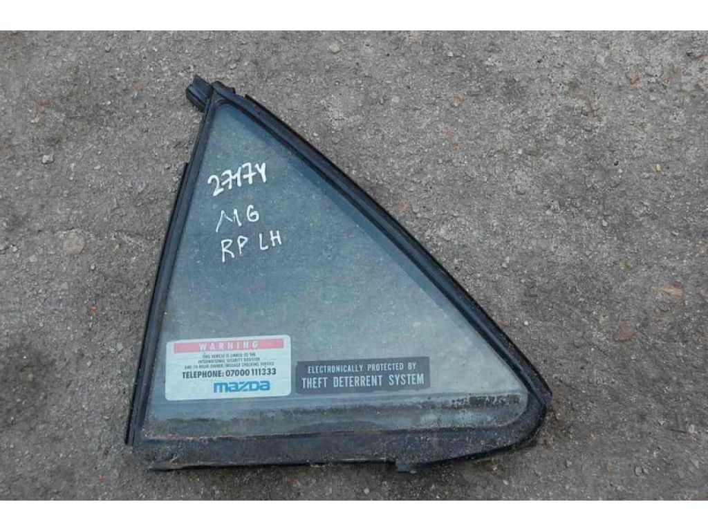 GK2A-73-661A | Стекло двери глухое задн. лев. MAZDA 6 GG 02-07