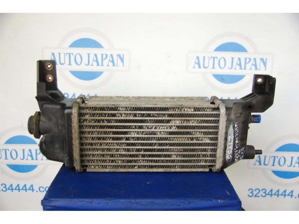 RF4P-13-565A | Радиатор интеркулера MAZDA 323 BJ 98-2003