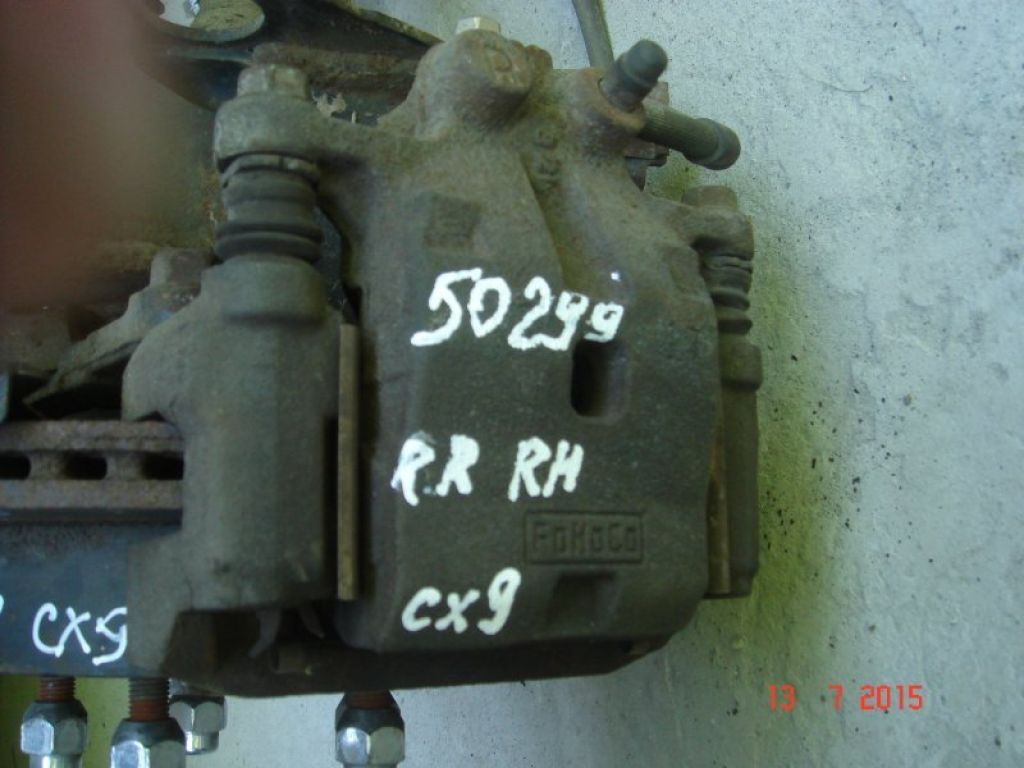 L2Z2-26-98ZA | Супорт гальмівний задн. прав. MAZDA CX-9 06-16