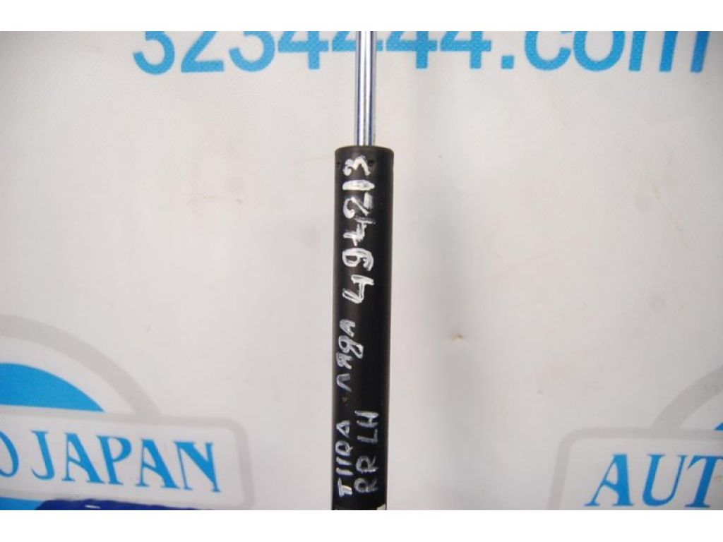 90451-EL00A | Амортизатор крышки багажника лев. NISSAN TIIDA/VERSA C11 04-11 - Фото 2