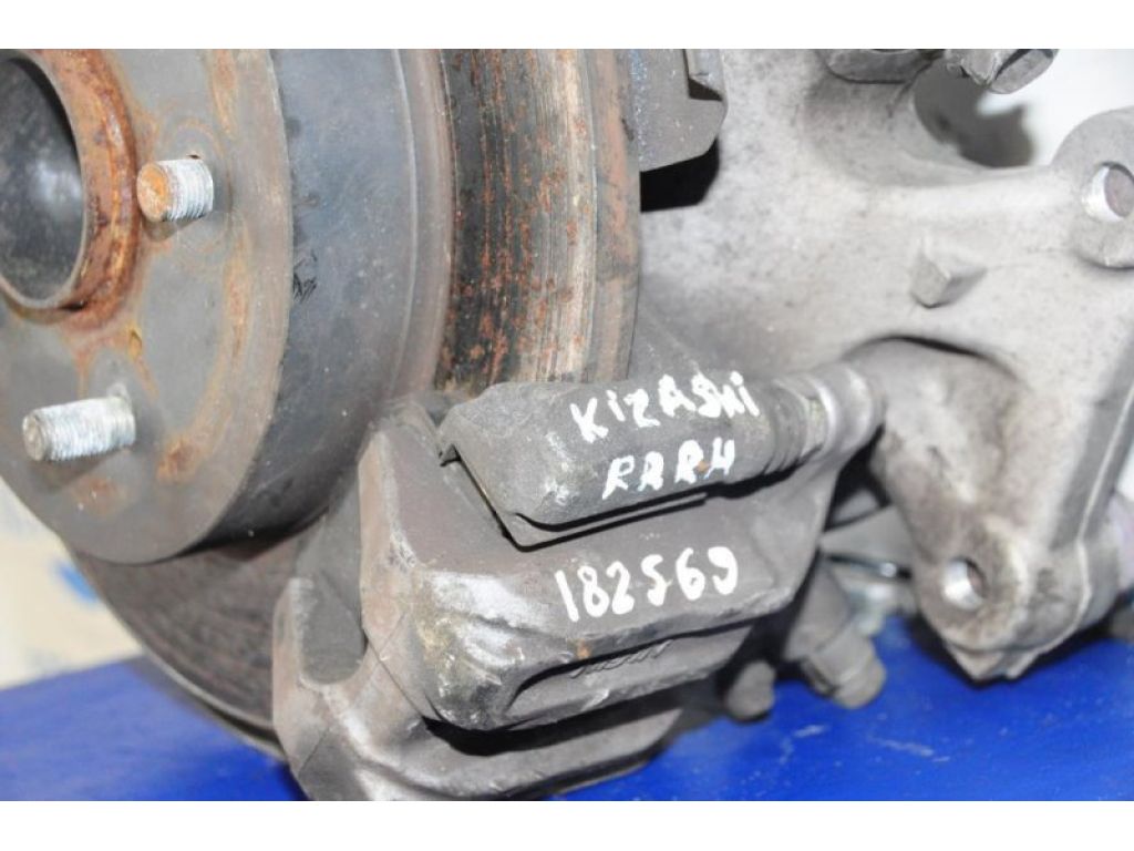55402-57L00-999 | Супорт гальмівний задн. лів. SUZUKI KIZASHI 09-14