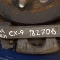 L2Z2-26-99ZA | Суппорт тормозной задн. лев. MAZDA CX-9 06-16