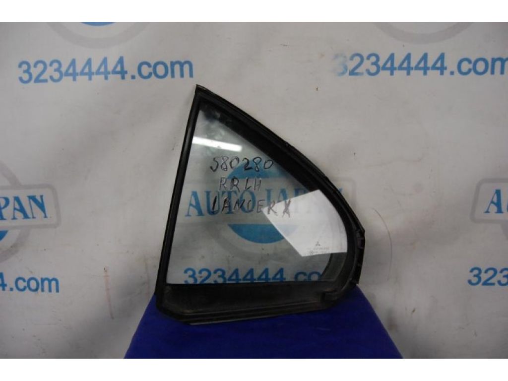 5740A017 | Стекло двери глухое задн. лев. MITSUBISHI LANCER X 10 07-15