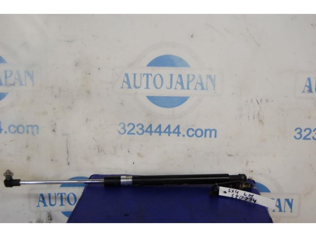 Амортизатор крышки багажника лев. SUZUKI SX4 06-13