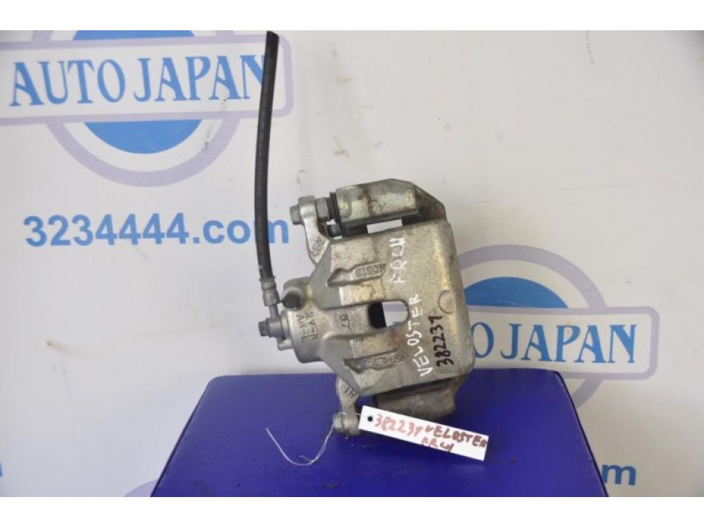 58110-2V200 | Суппорт тормозной передн. лев. HYUNDAI VELOSTER 11-18