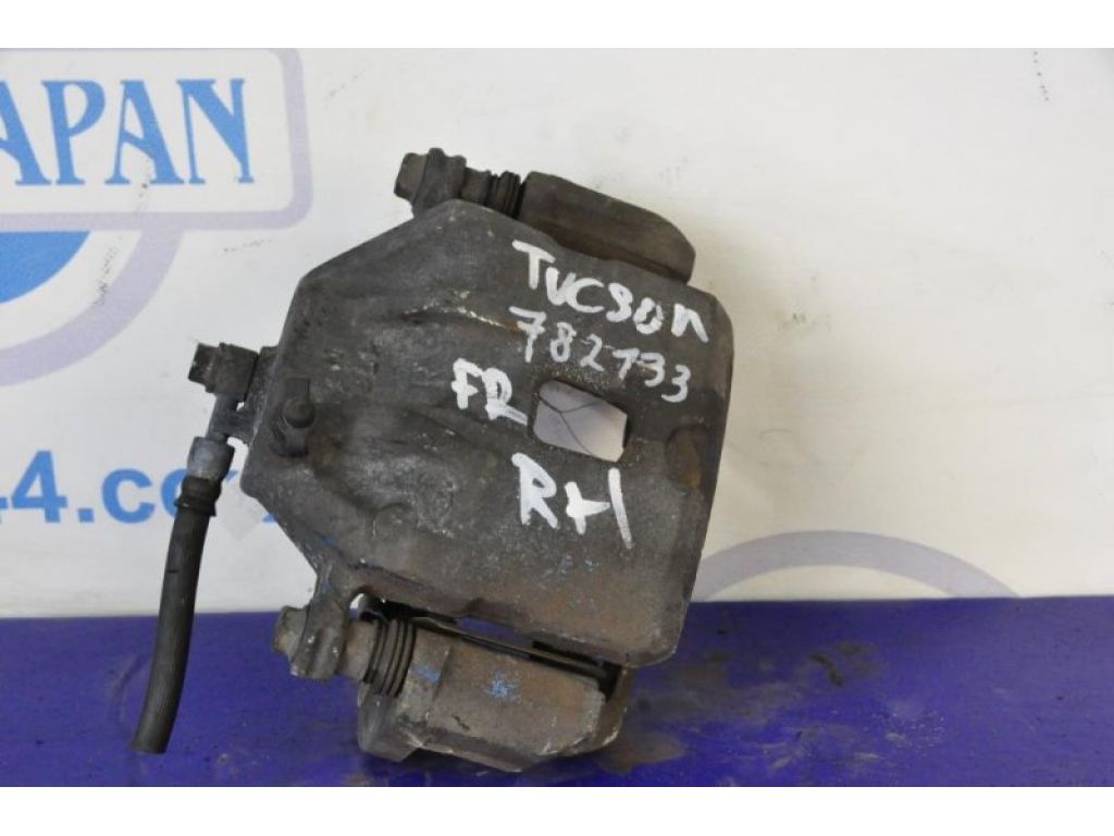 58190-2EA10 | Супорт гальмівний передн. прав. HYUNDAI TUCSON 04-10