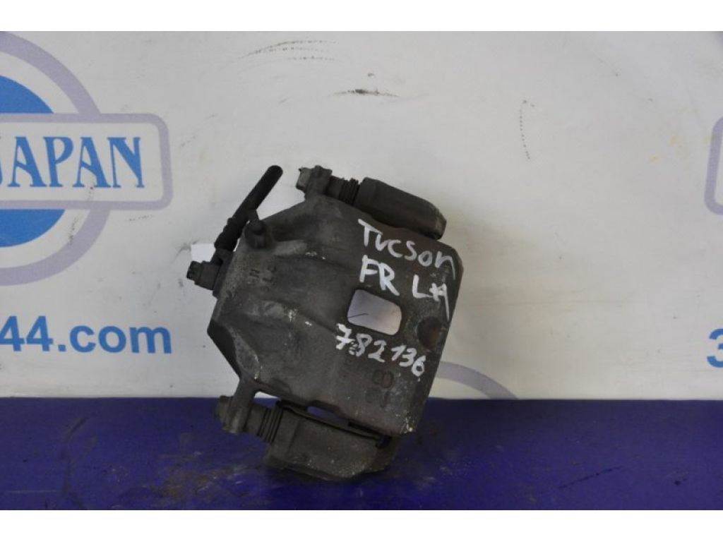 58110-2E500 | Супорт гальмівний передн. лів. HYUNDAI TUCSON 04-10