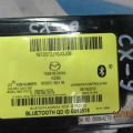 TE69-66-DHXA | Блок управления блютуз MAZDA CX-9 06-16 - Превью 3