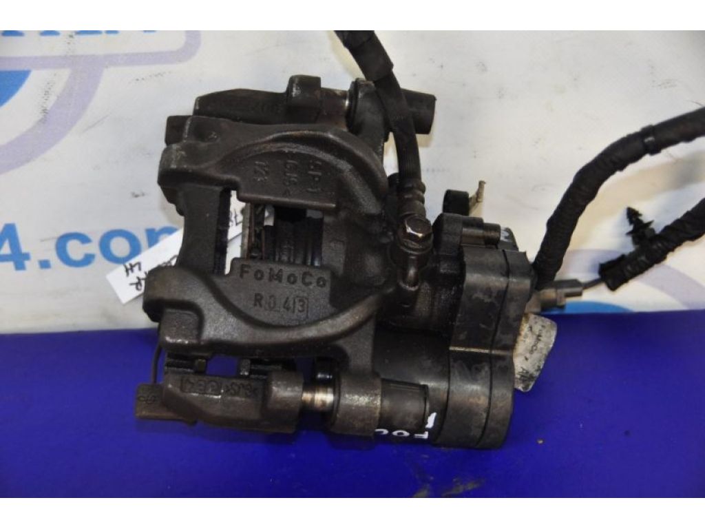 DG9Z-2553-B | Супорт гальмівний задн. лів. FORD FOCUS 10-18