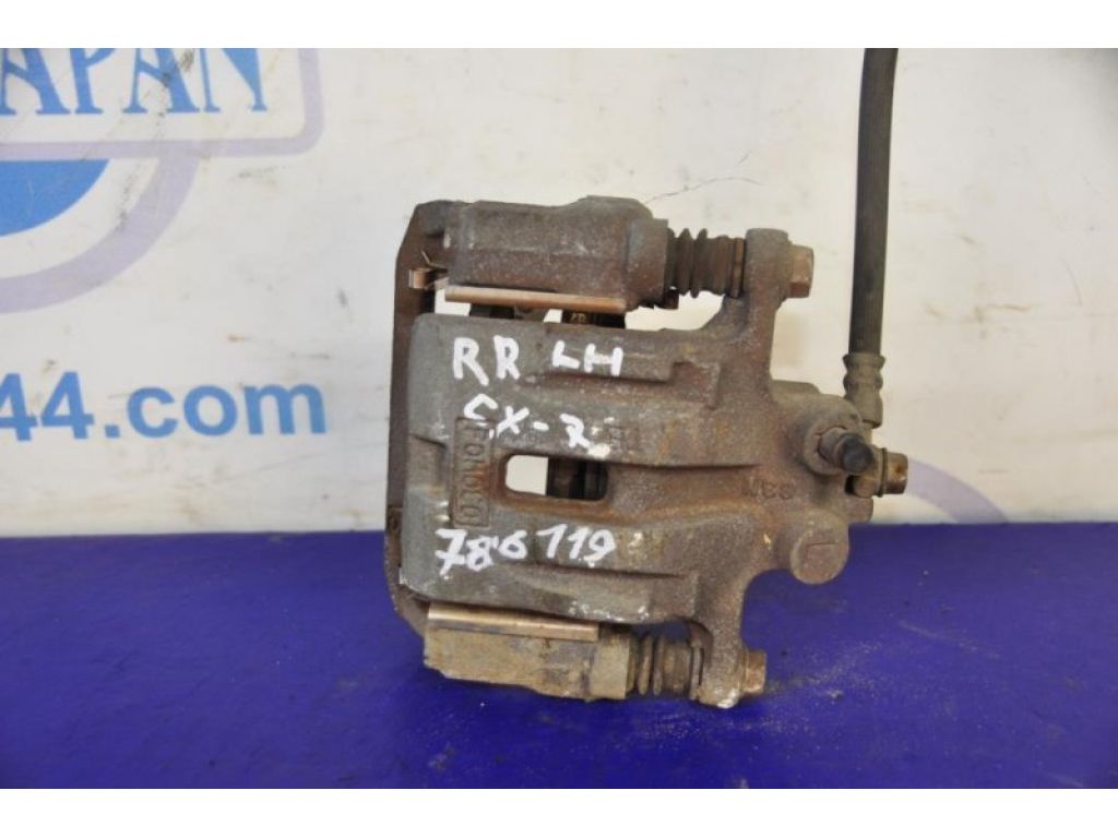 L2Z6-26-99ZA | Супорт гальмівний задн. лів. MAZDA CX-7 06-12 - Фото 2