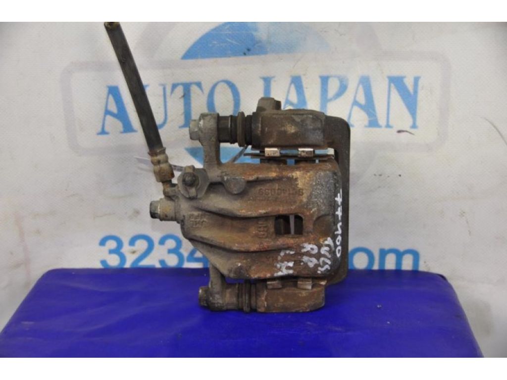 58310-2EA10 | Суппорт тормозной задн. лев. HYUNDAI TUCSON 04-10