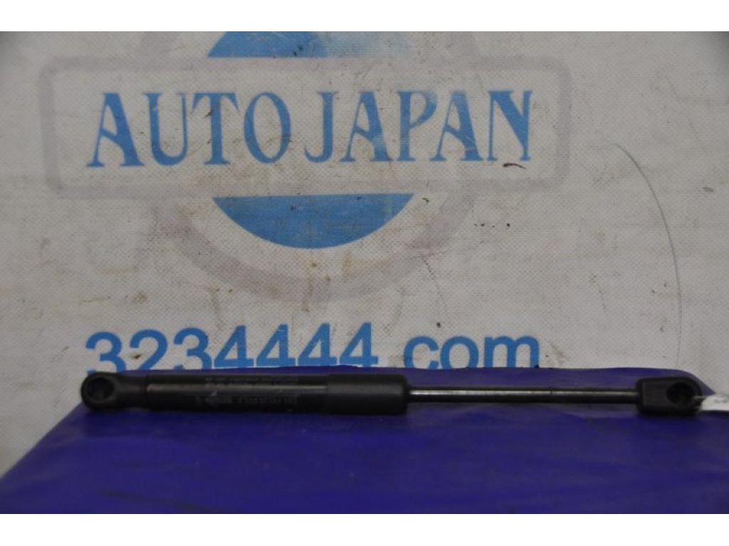 57522AL00A | Амортизатор кришки багажника лів. SUBARU LEGACY BN 14-18