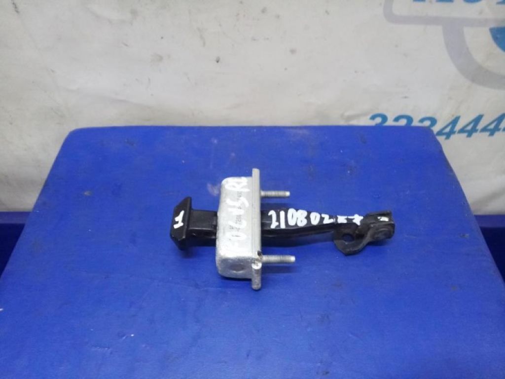 CP9Z-5823500-A | Обмежувач дверей задн. лів. FORD FOCUS 10-18