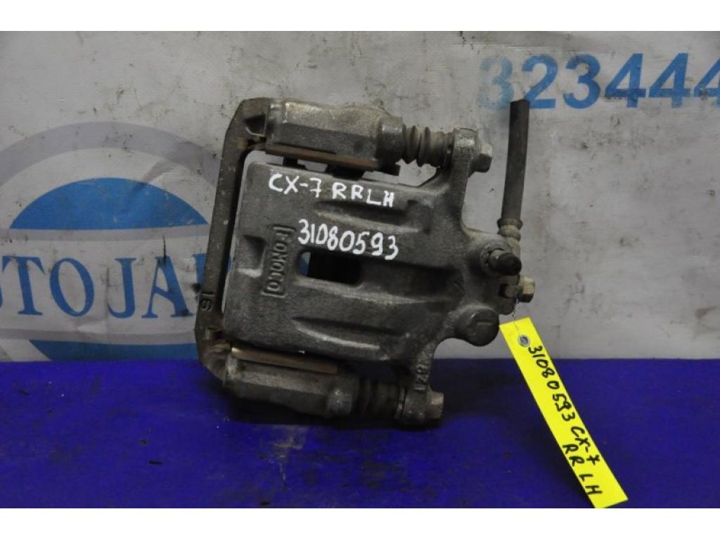 L2Z6-26-99ZA | Супорт гальмівний задн. лів. MAZDA CX-7 06-12