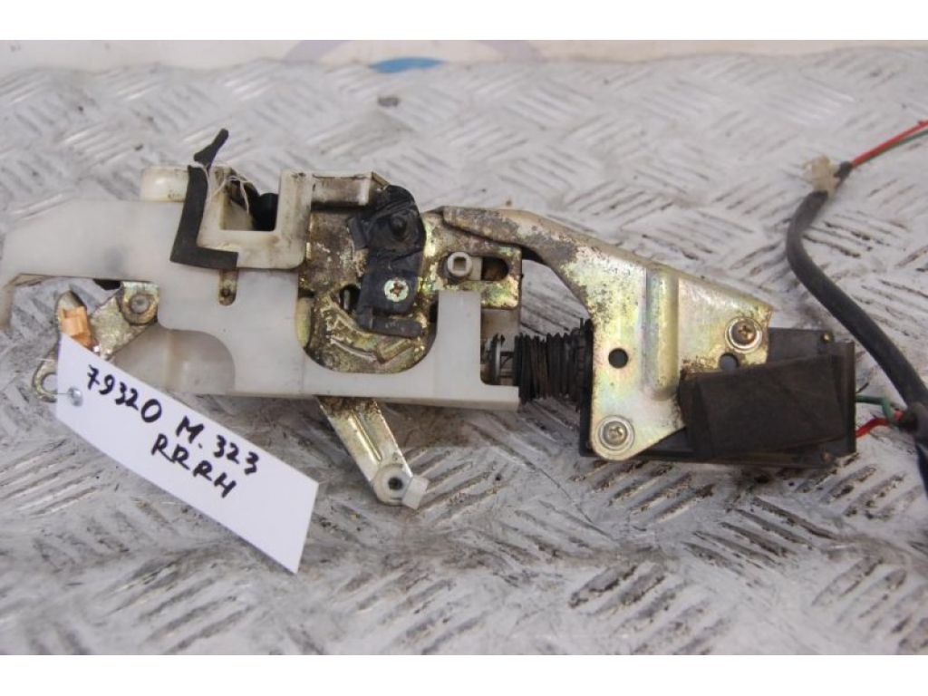 B01A-72-310G | Замок двері задн. прав. MAZDA 323 BA 94-97