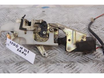 Замок двері задн. прав. MAZDA 323 BA 94-97