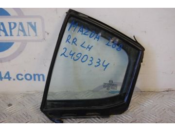 Стекло двери глухое задн. лев. MAZDA 3 BM 13-19