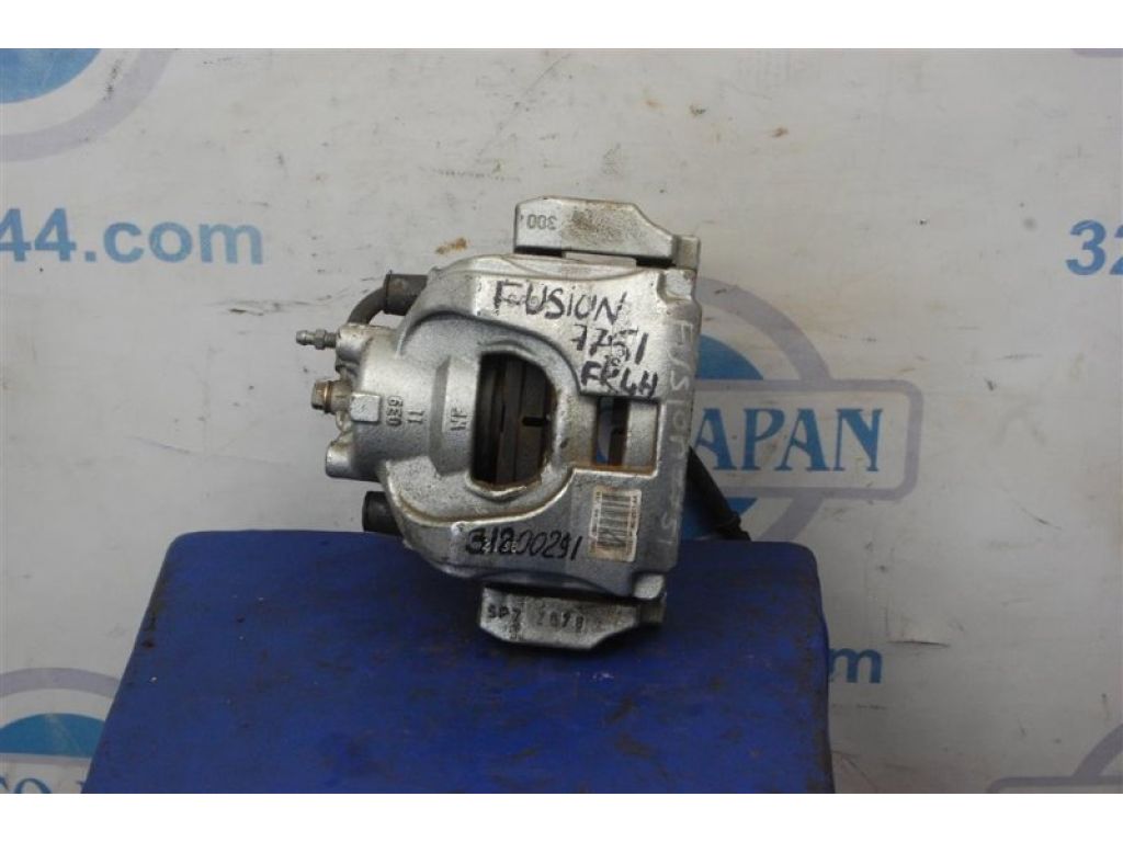 DG9Z-2B121-A | Суппорт тормозной передн. лев. FORD FUSION 14-