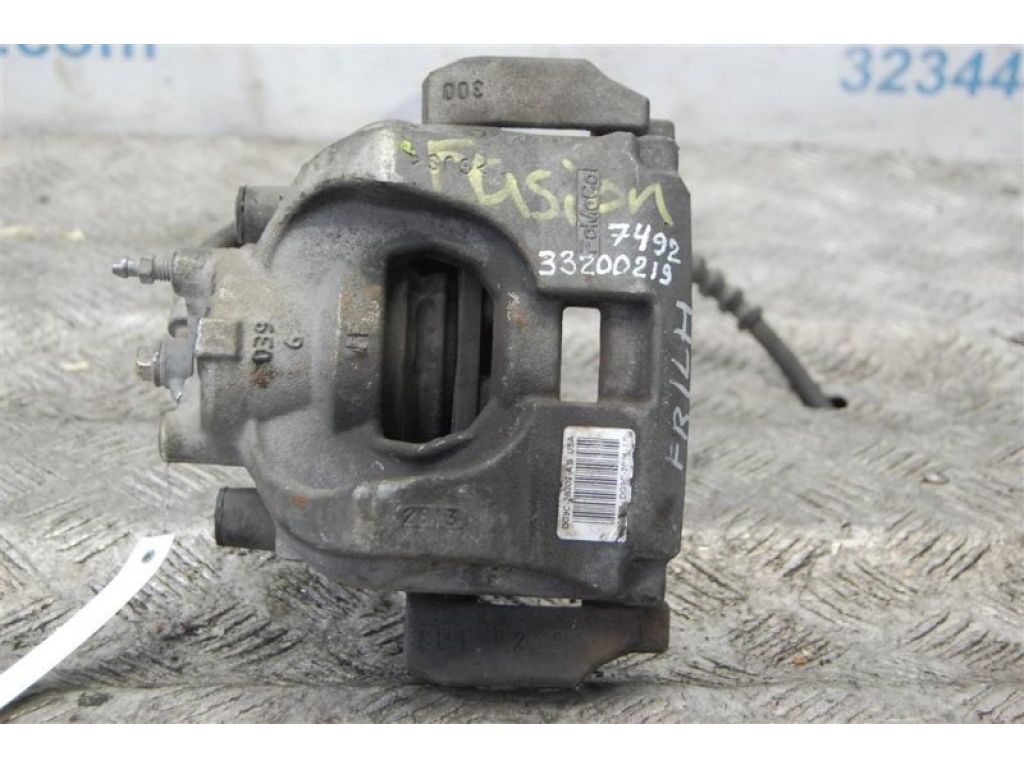 DG9Z-2B121-A | Суппорт тормозной передн. лев. FORD FUSION 14-