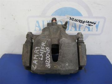 Суппорт тормозной передн. лев. TOYOTA CAMRY 40 06-11
