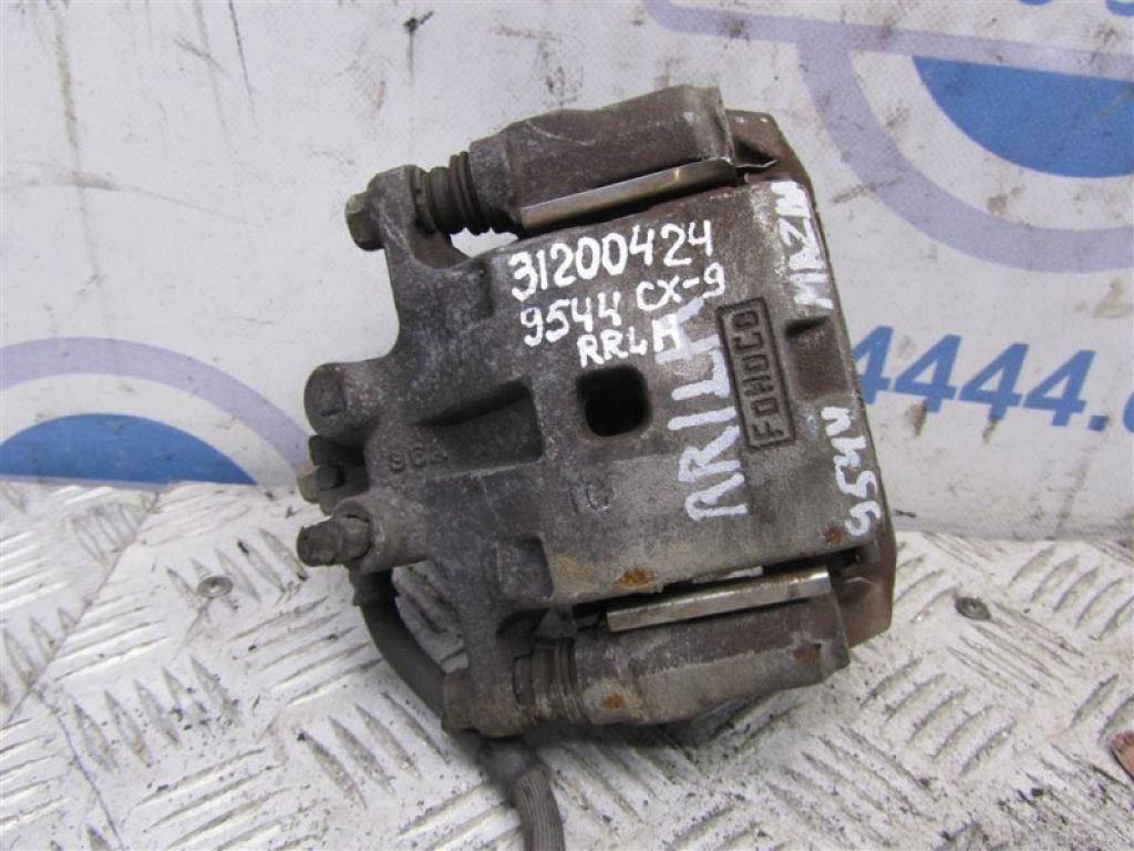 L2Z2-26-99ZA | Суппорт тормозной задн. лев. MAZDA CX-9 06-16