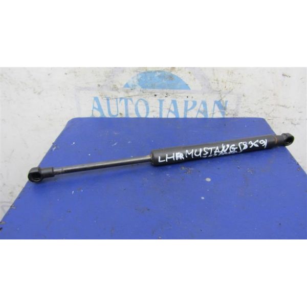 Амортизатор кришки багажника лівий FORD MUSTANG 15- FR3B-63406A10-AA