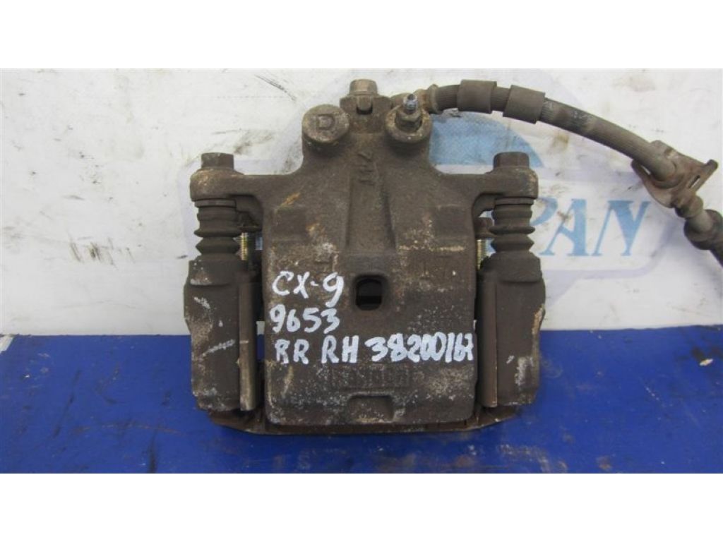 L2Z2-26-98Z | Суппорт тормозной задн. прав. MAZDA CX-9 06-16