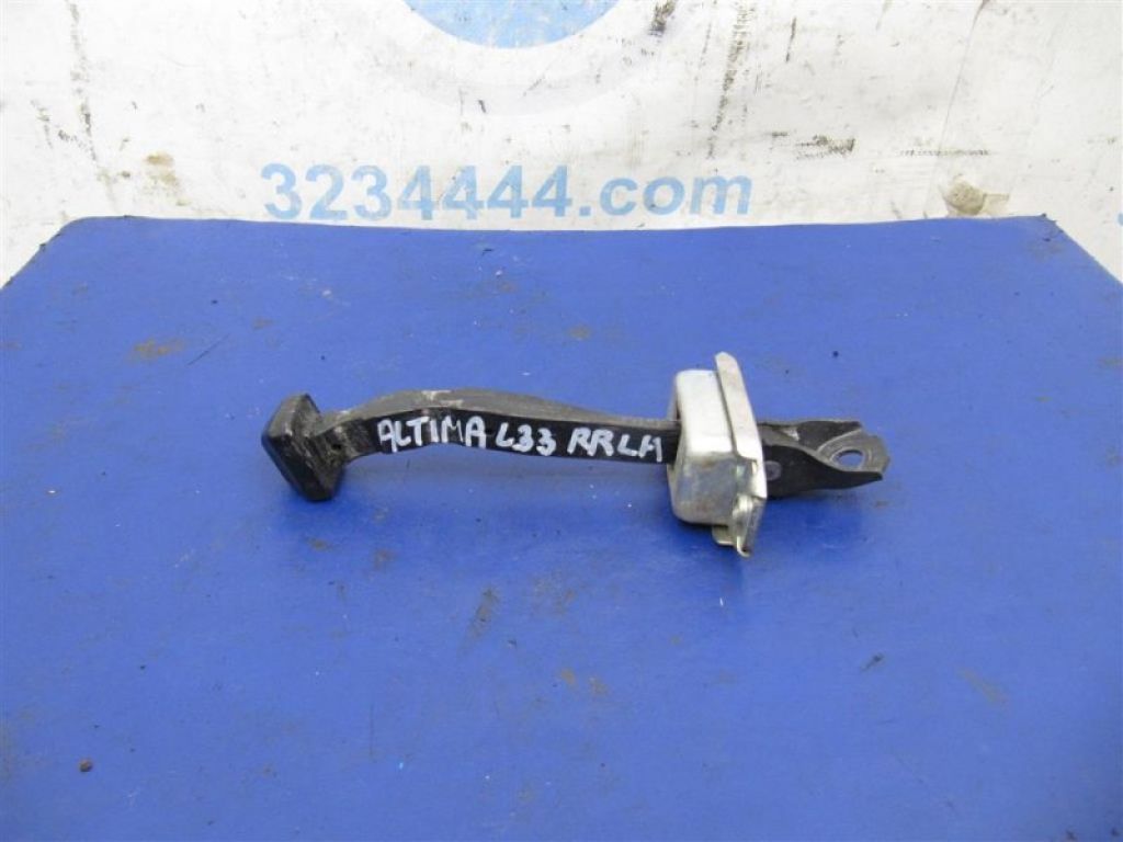 82430-3TA0A | Обмежувач дверей задн. лів. NISSAN ALTIMA L33 12-18