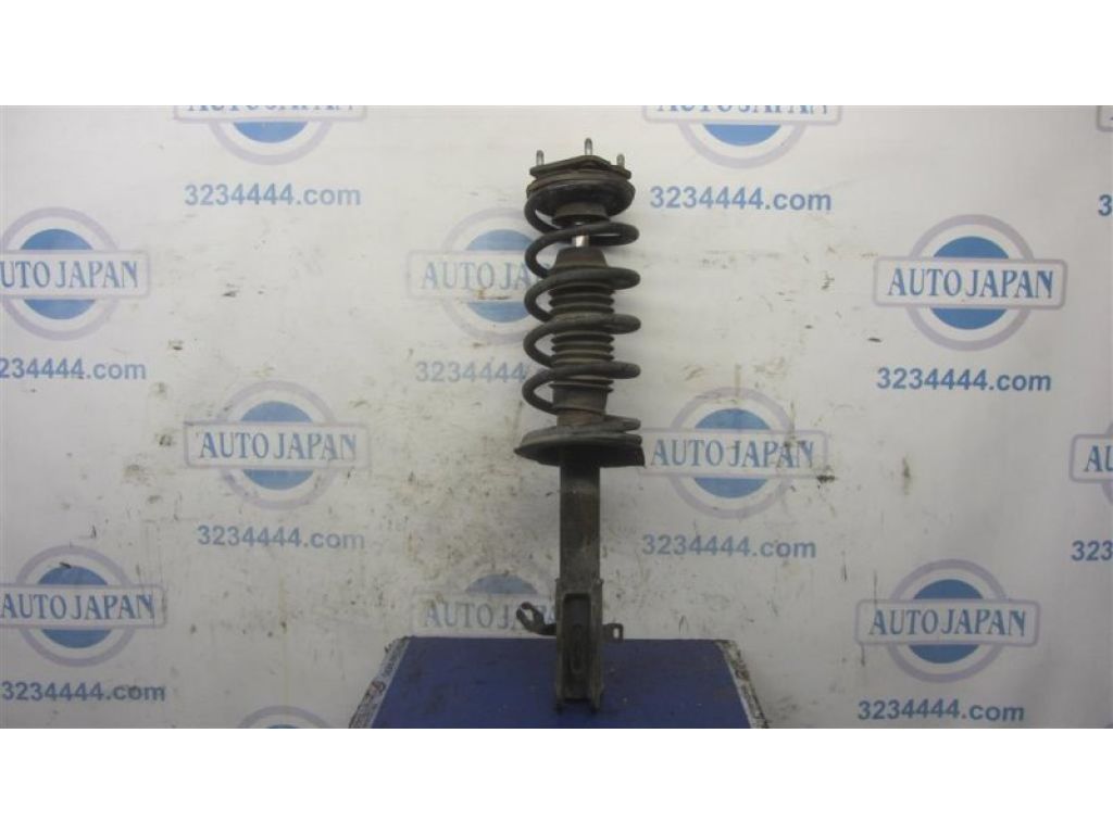 EH46-34-900 | Амортизатор передн. лев. MAZDA CX-7 06-12