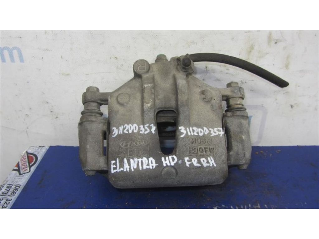58130-2L000 | Суппорт тормозной передн. прав. HYUNDAI ELANTRA HD 06-11