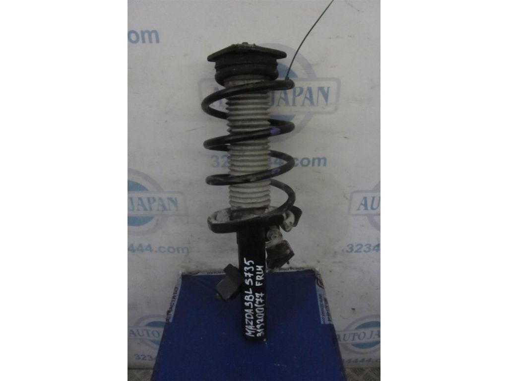 BBM2-34-900C | Амортизатор передн. лев. MAZDA 3 BL 09-13