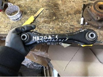 Рычаг задней подвески поперечный нижний лев. MAZDA 3 BL 09-13