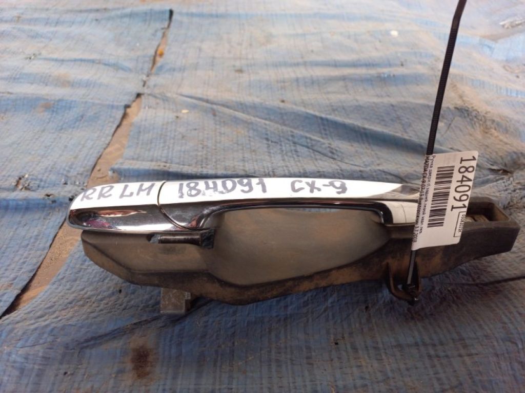 TD88-59-410D | Ручка двері зовнішня задн. лів. MAZDA CX-9 06-16