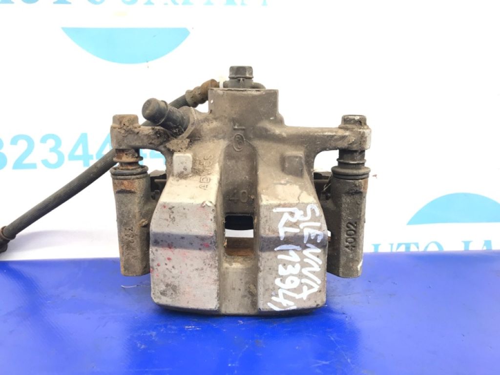 47850-0E021 | Суппорт тормозной задн. лев. TOYOTA SIENNA 11-16