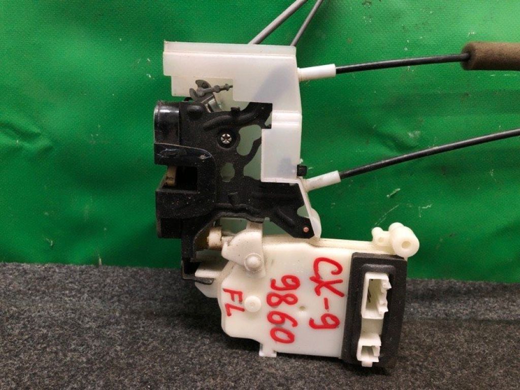 TD11-59-310D | Замок двері передн. лів. MAZDA CX-9 06-16