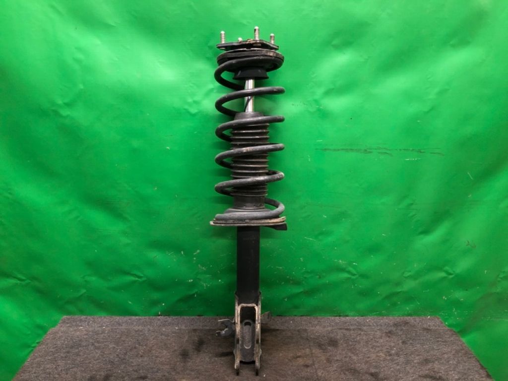 EH48-34-900 | Амортизатор передн. лів. MAZDA CX-7 06-12