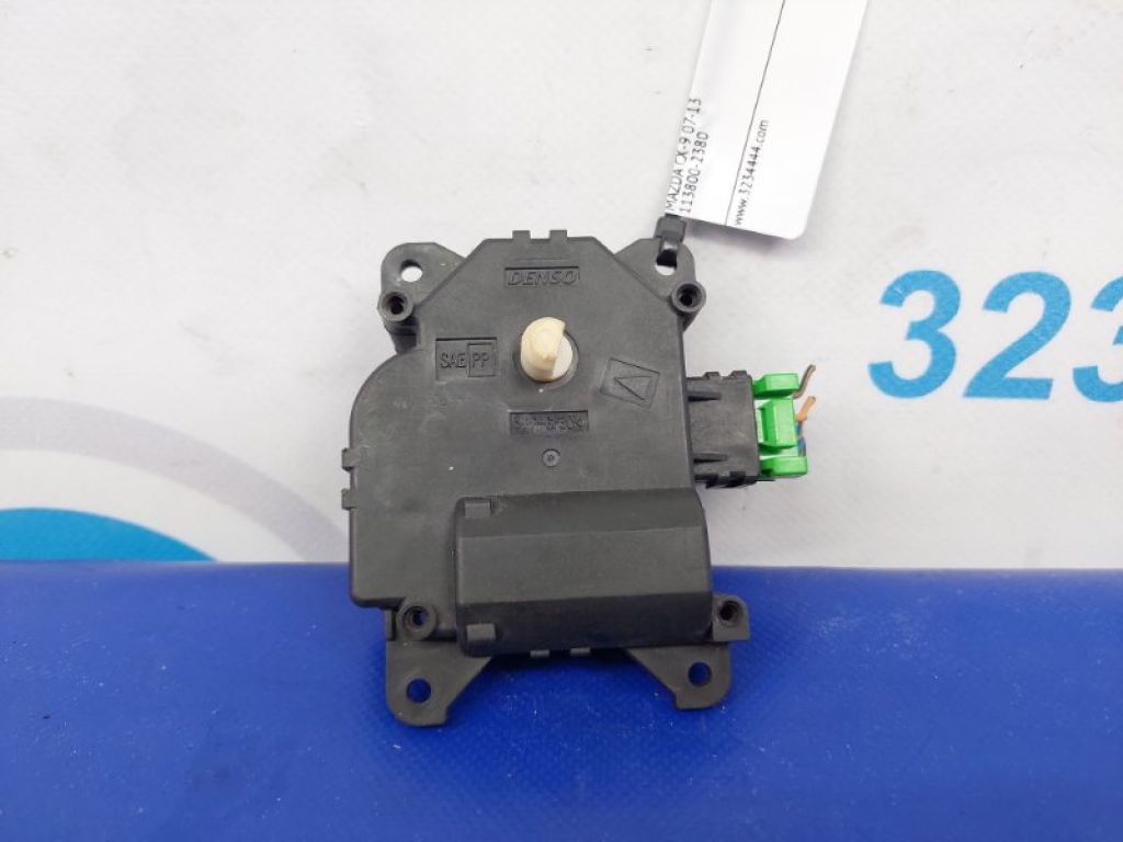 TD14-61-A60 | Моторчик заслонки печки задн. MAZDA CX-9 06-16