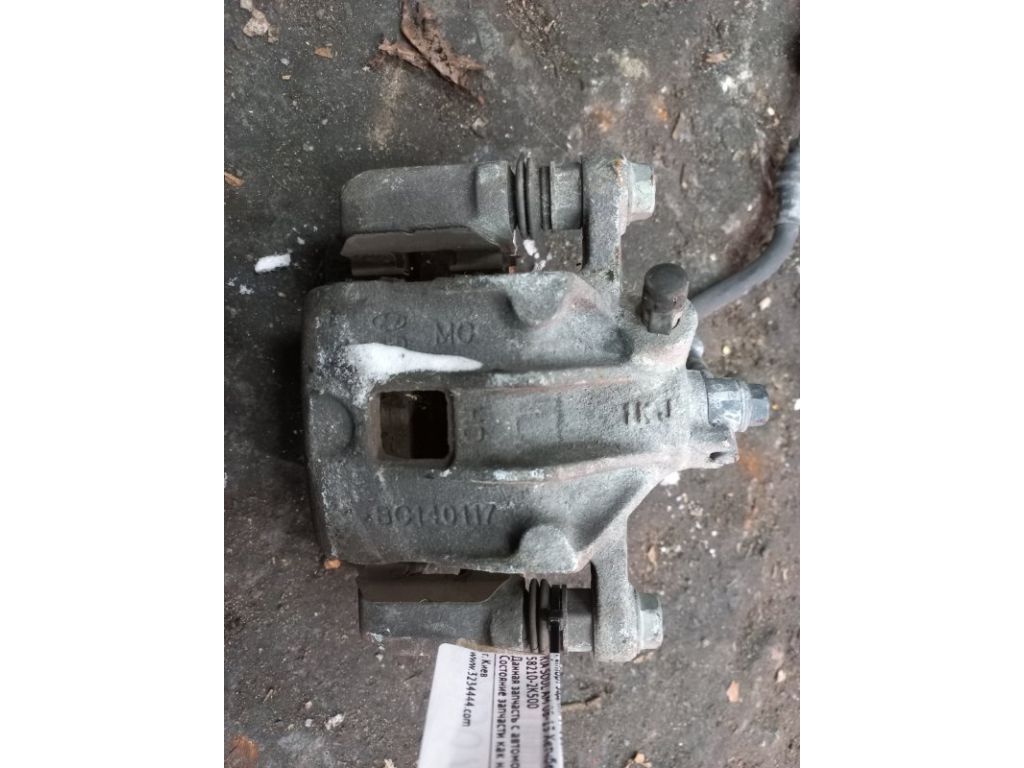 58210-2K500 | Суппорт тормозной задн. лев. KIA SOUL AM 08-13