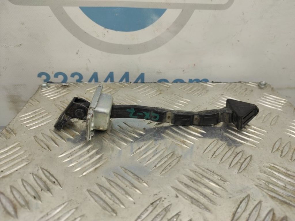 EG21-58-270P | Ограничитель двери передн. лев. MAZDA CX-7 06-12 - Фото 4