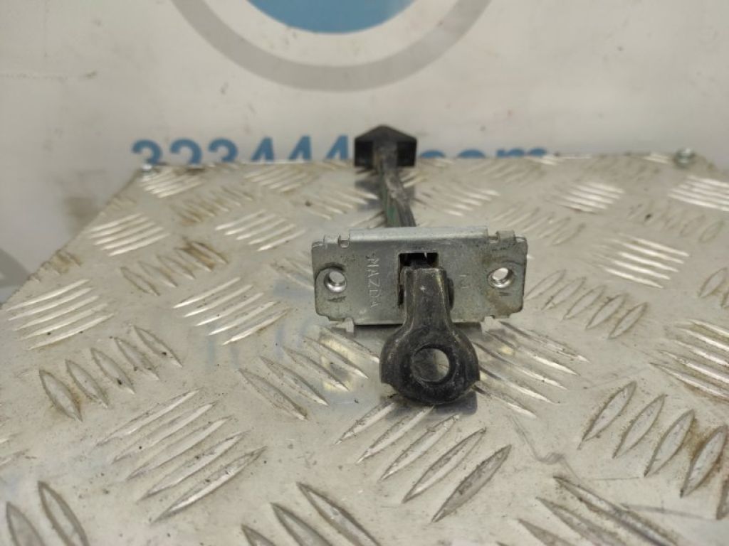 EG21-58-270P | Ограничитель двери передн. лев. MAZDA CX-7 06-12 - Фото 5