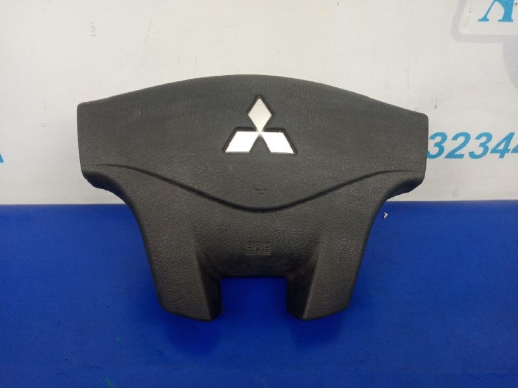 7030A005XA | Подушка безпеки в кермо MITSUBISHI GALANT 03-12