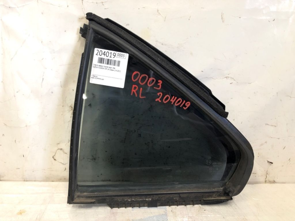 84556-57L00 | Стекло двери глухое задн. лев. SUZUKI KIZASHI 09-14