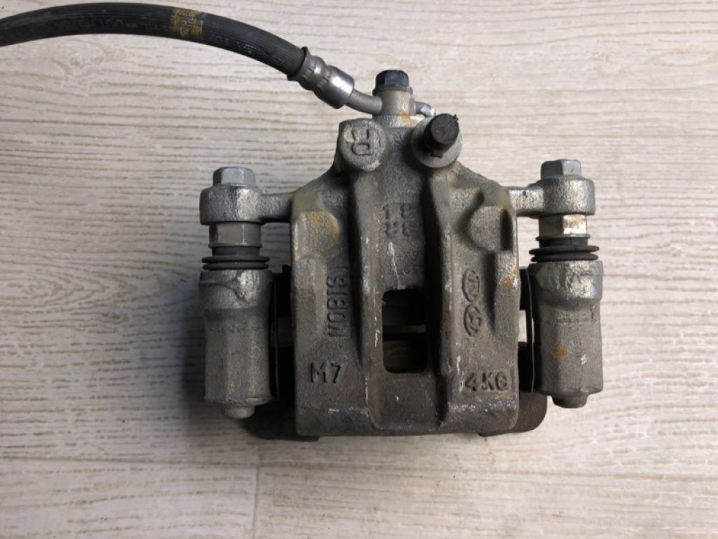 58230-2S100 | Супорт гальмівний задн. прав. HYUNDAI TUCSON LM 09-15